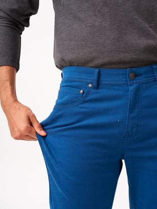 close-up front view of imperial blue jeanos by pant project showcasing stretch fabric