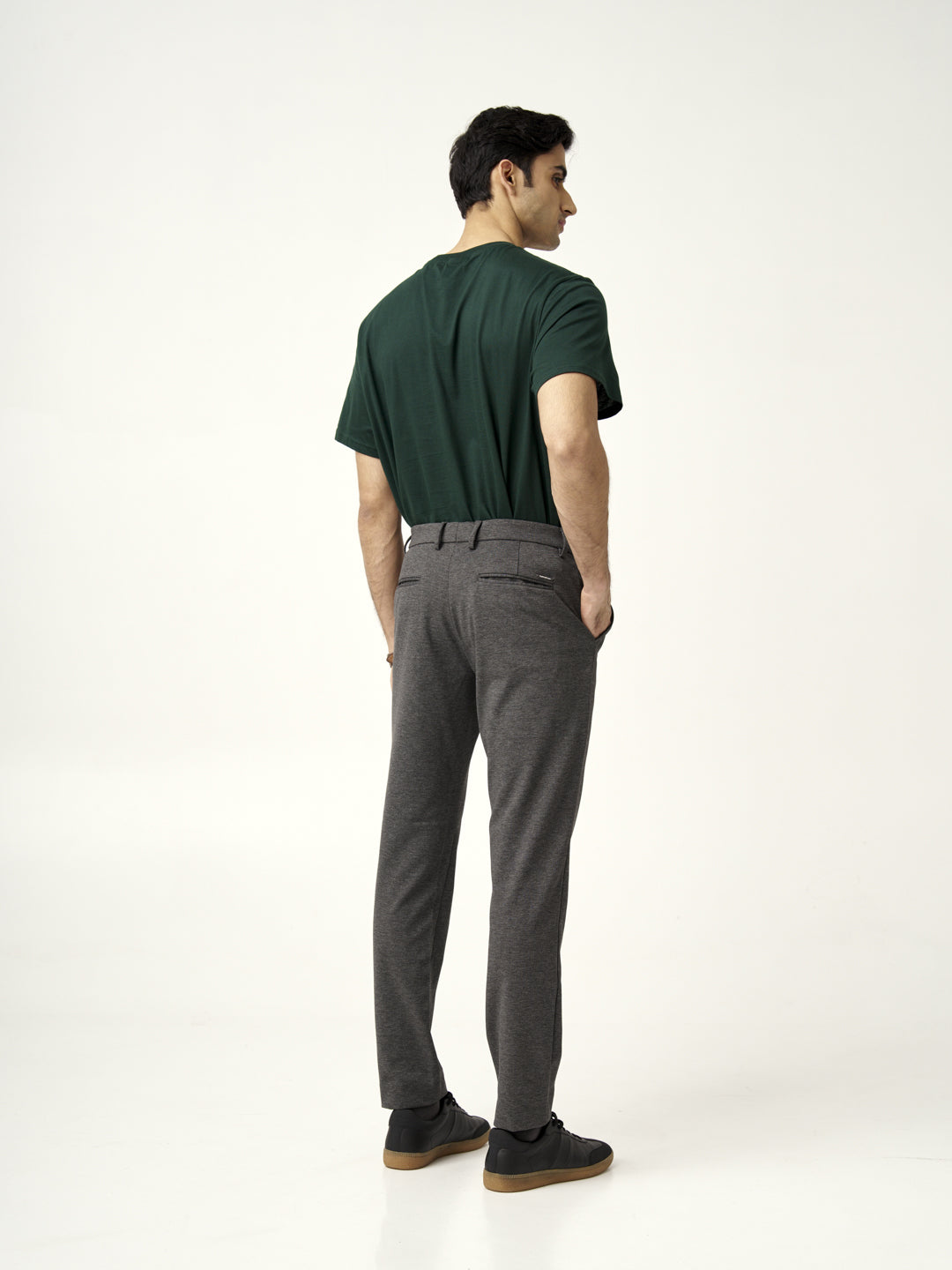 front view of man in charcoal pants from the Pant Project with hands in pockets