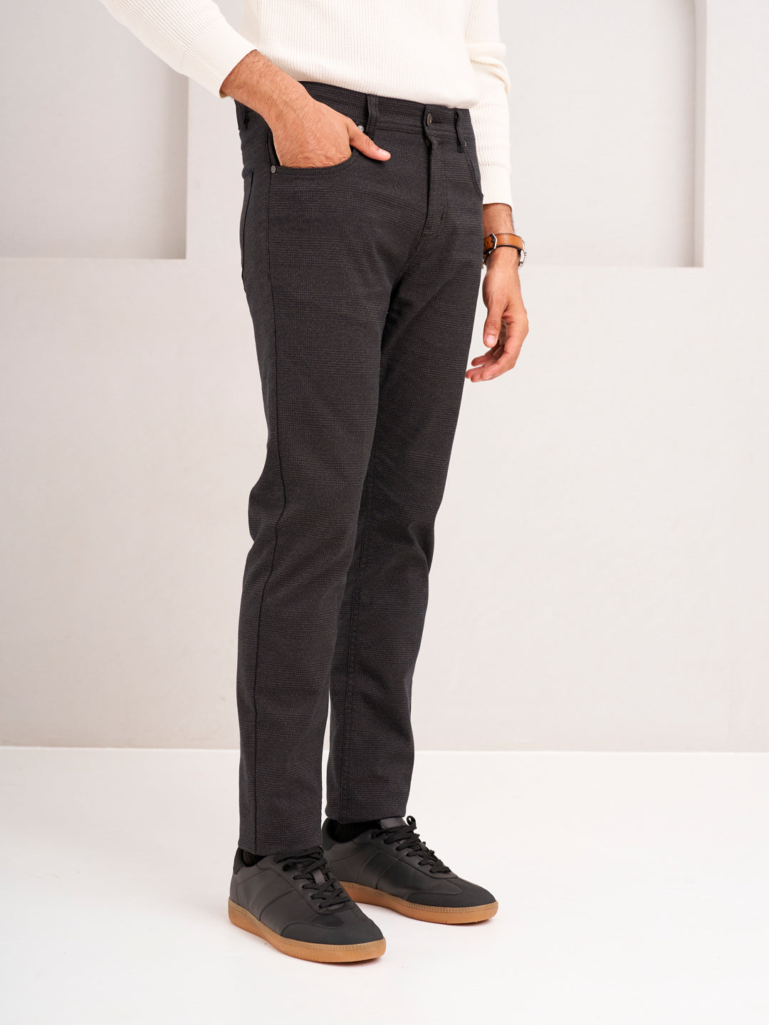 side view of wood brown check jeanos by pant project showcasing tailored fit