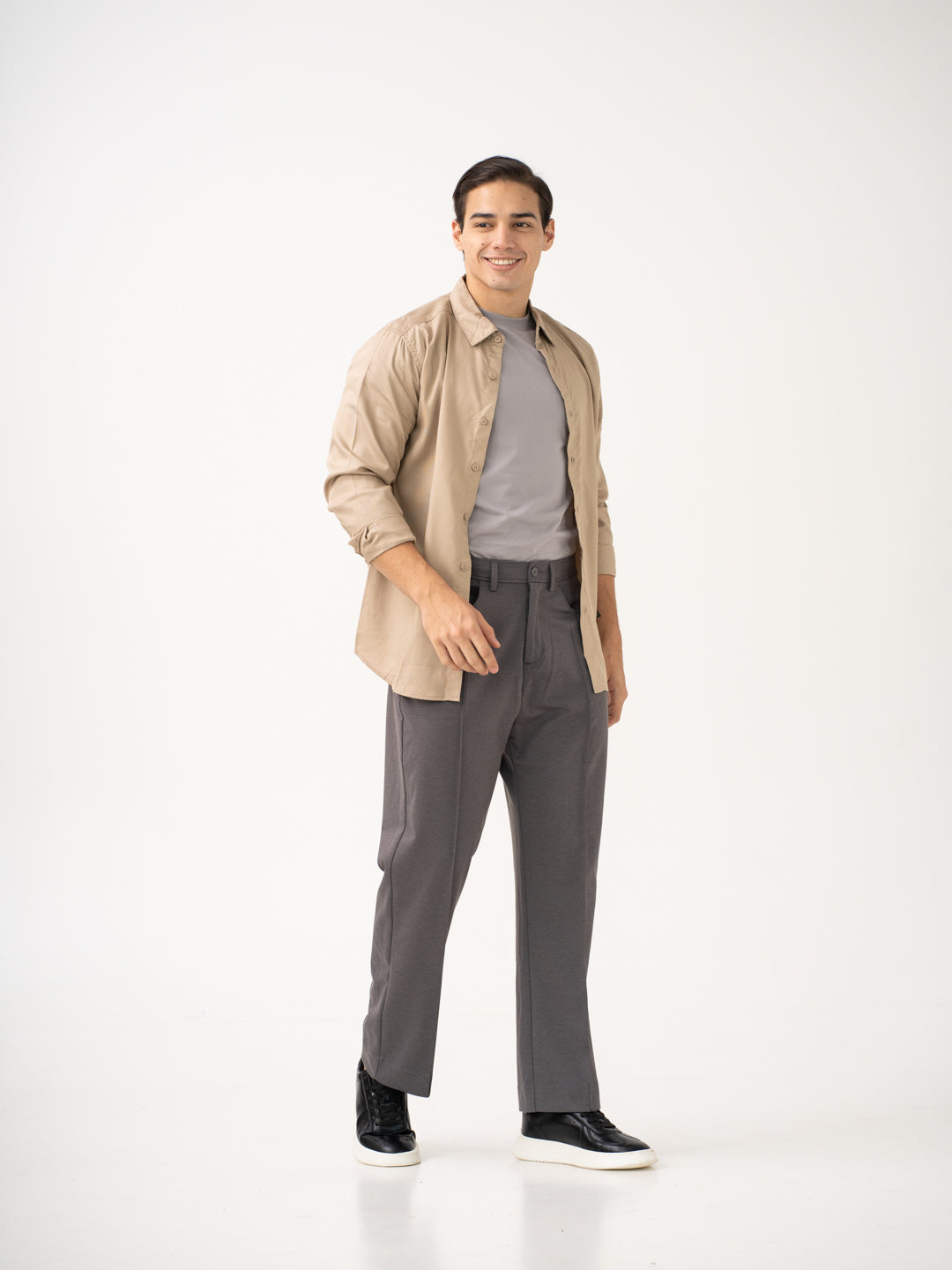 Full view of grey pants by Pant Project, focusing on the relaxed fit and drape