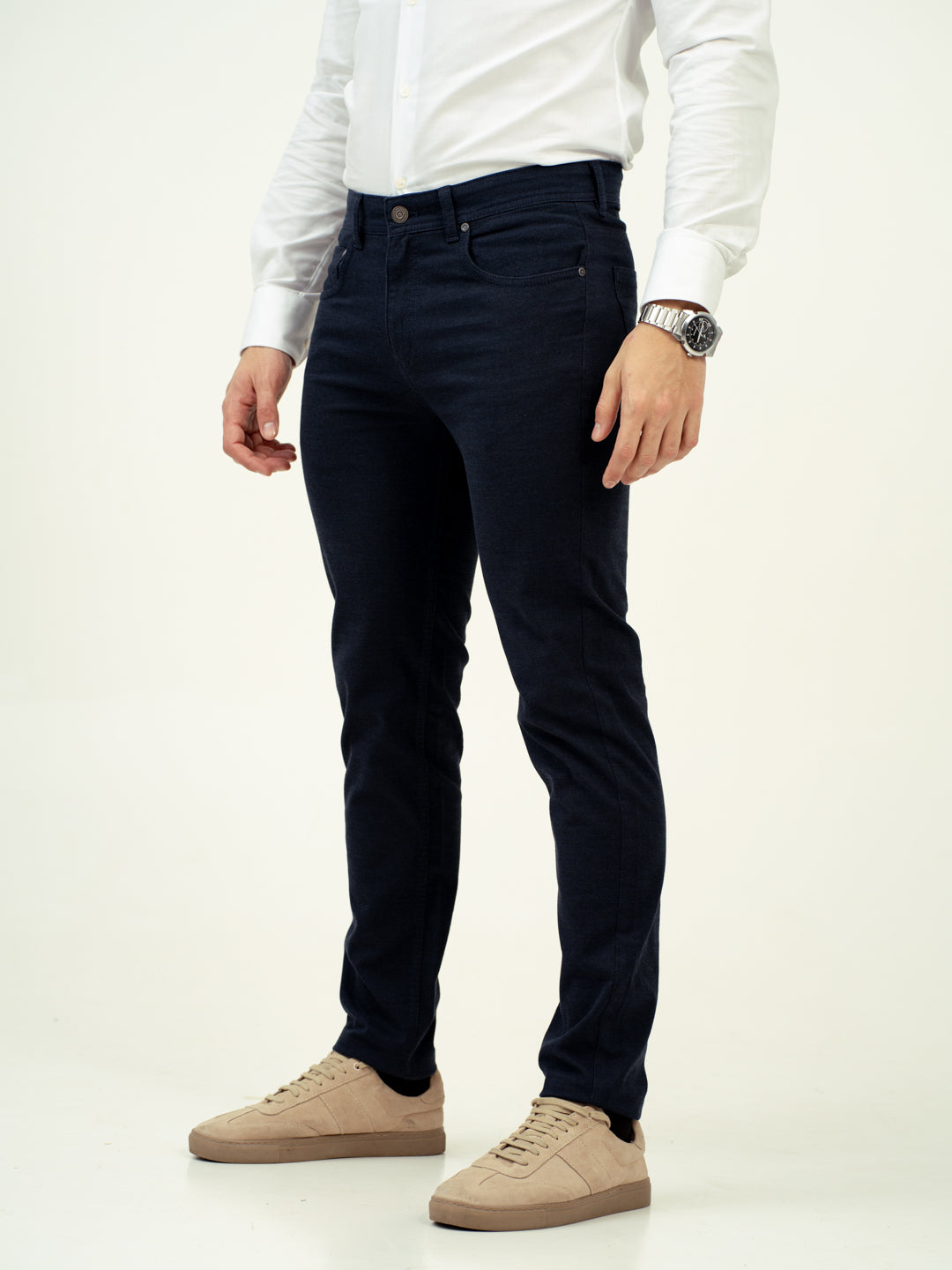 front view of navy jeans by pant project with slim fit