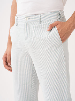 Meadow green tailored trousers by pant project, showcasing the sleek fit and soft fabric texture.