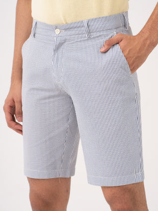 Captain navy blue tailored trousers by pant project, showcasing the sleek design and comfortable fit in a studio setting.