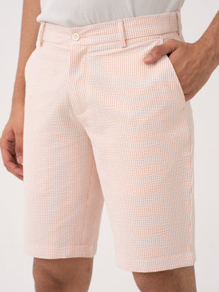 Poppy peach stretchable trousers by pant project, highlighting the sleek design and comfortable fit.