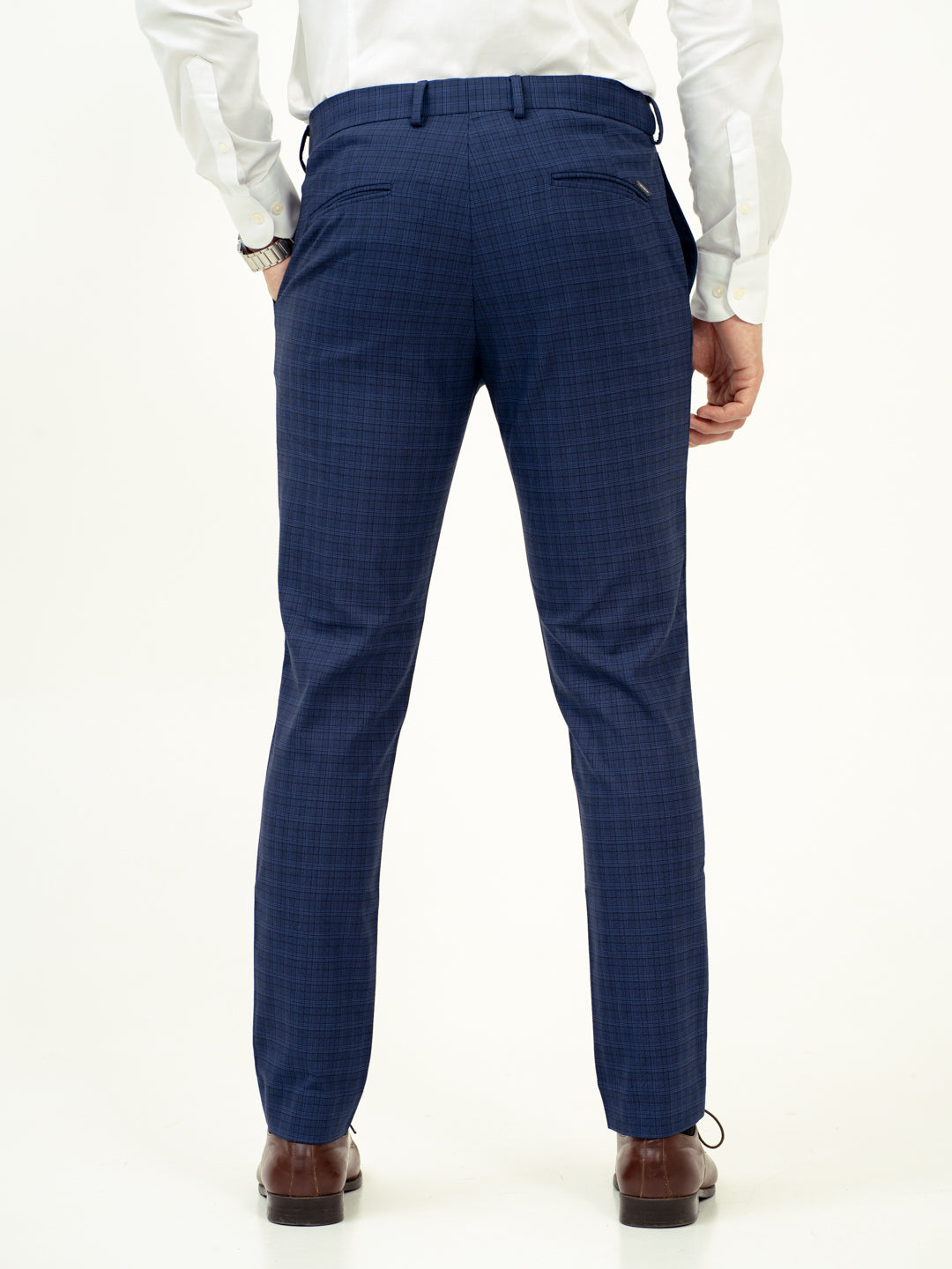rear view of blue checkered pant by pant project classic fit