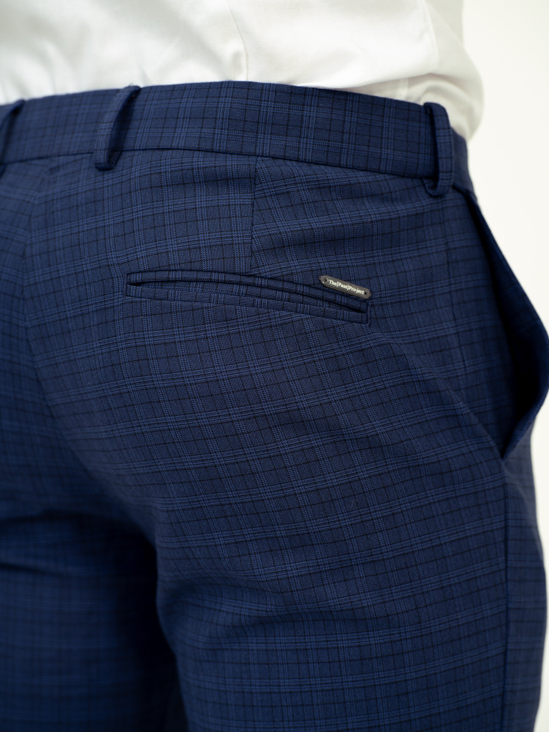 close-up side view of blue plaid pant by pant project detailed texture