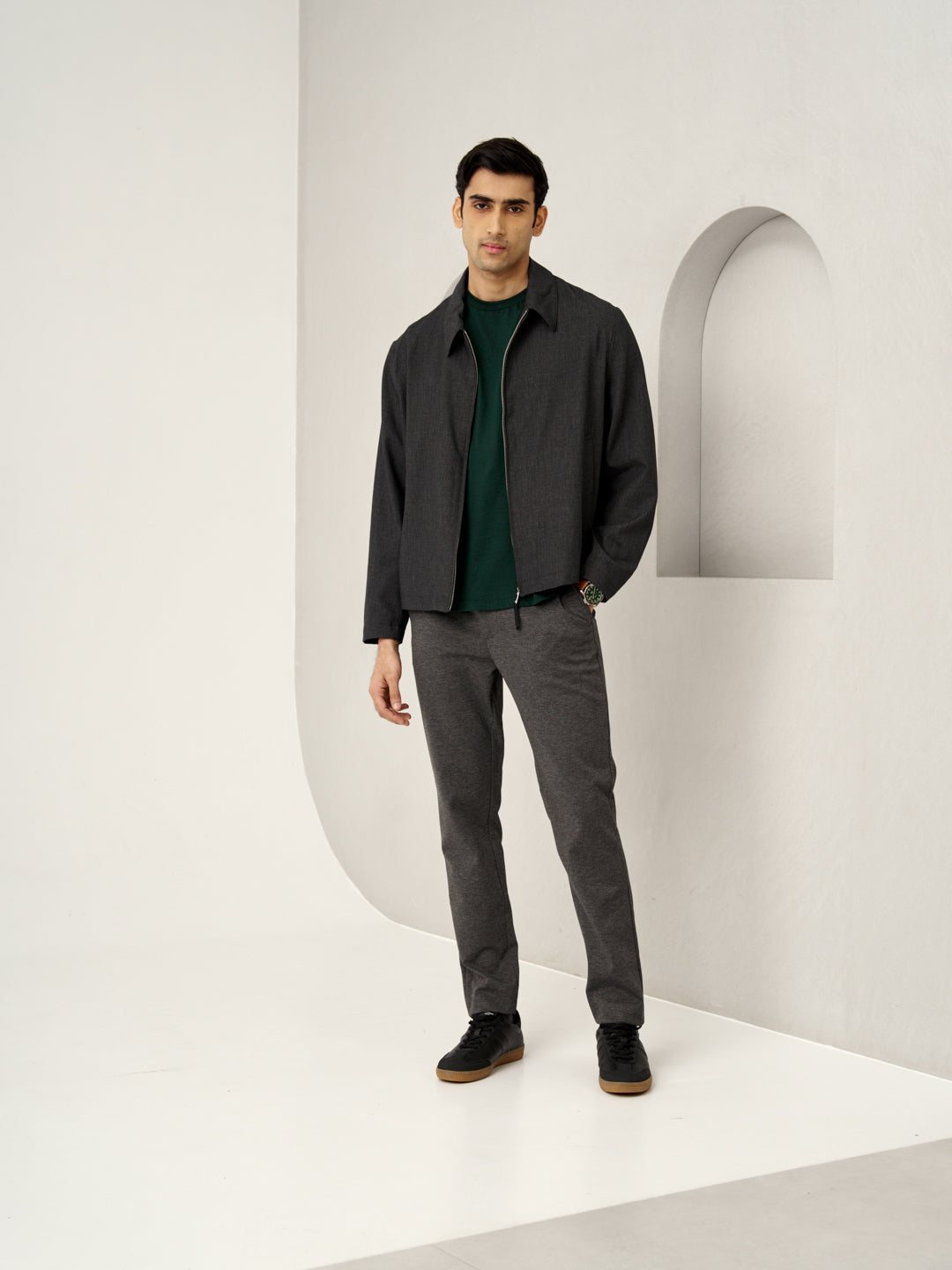 back view of charcoal pants with the Pant Project branding on the pocket