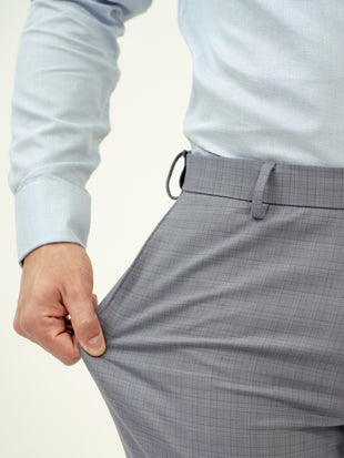 close-up side view of grey check pant by pant project highlighting texture