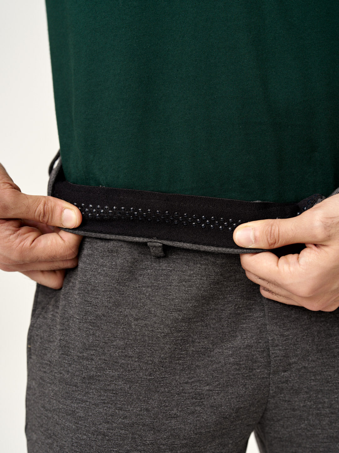 stretchable charcoal pants fabric displayed by the Pant Project model