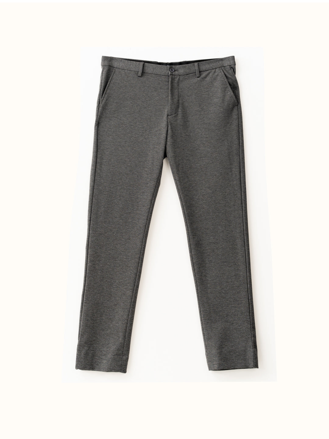 man wearing charcoal pants from the Pant Project showcasing waistband details