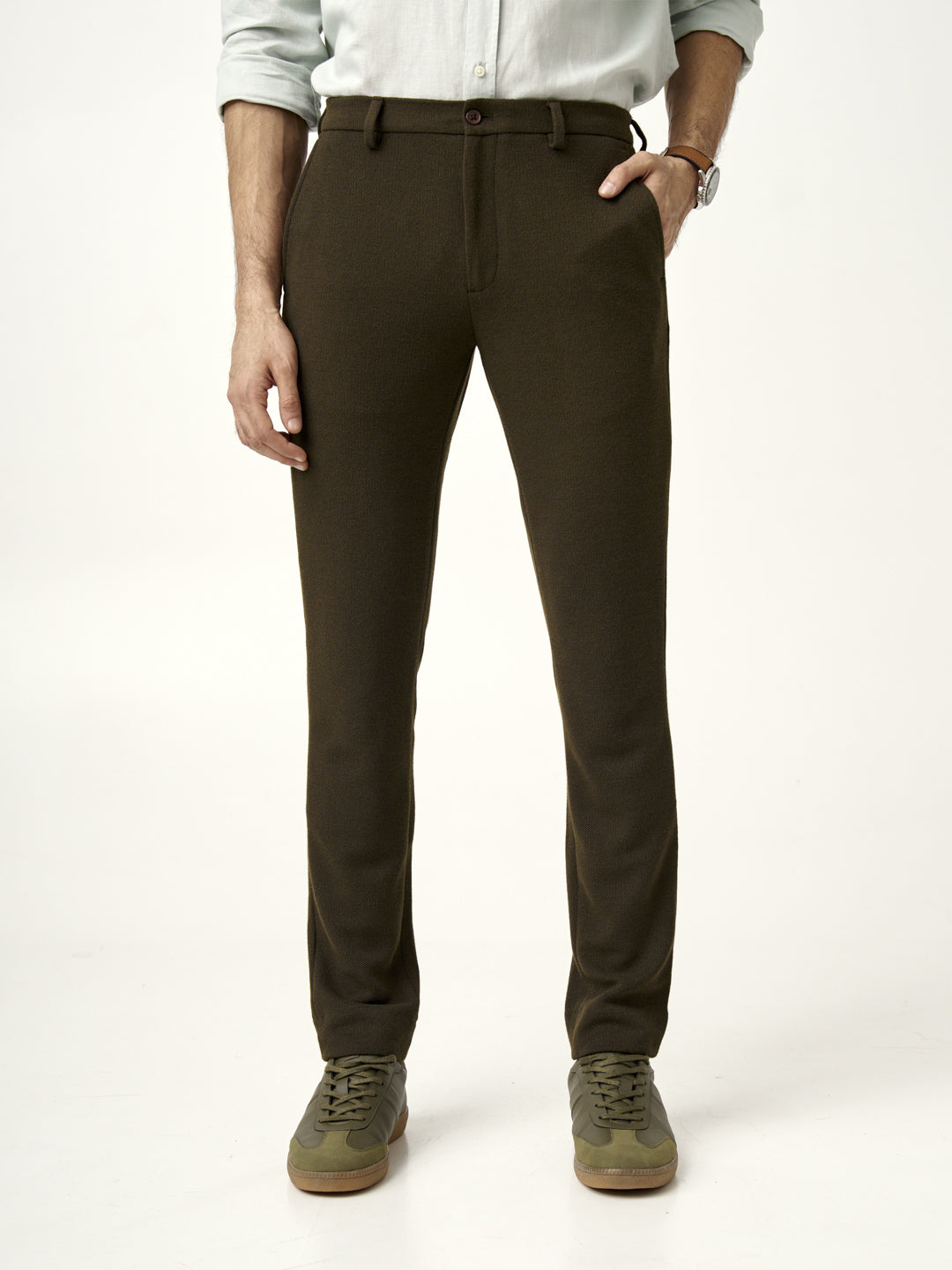 front view of olive green textured pants with button closure, from the Pant Project
