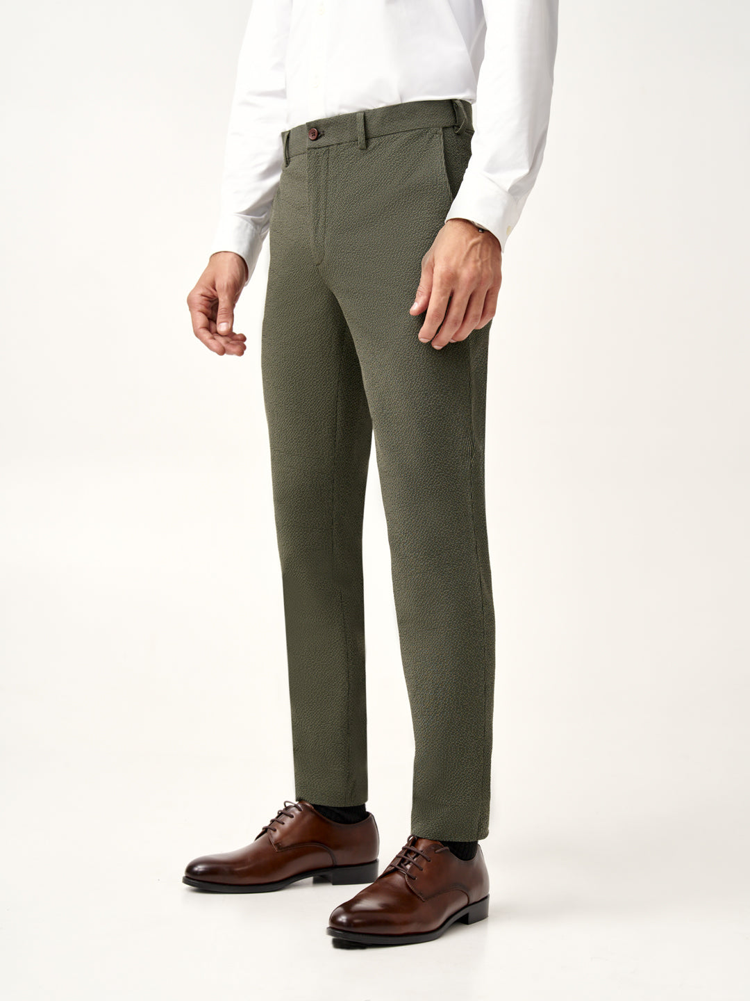 full length view of olive chandigarh seer sucker stretchable trousers by Pant Project
