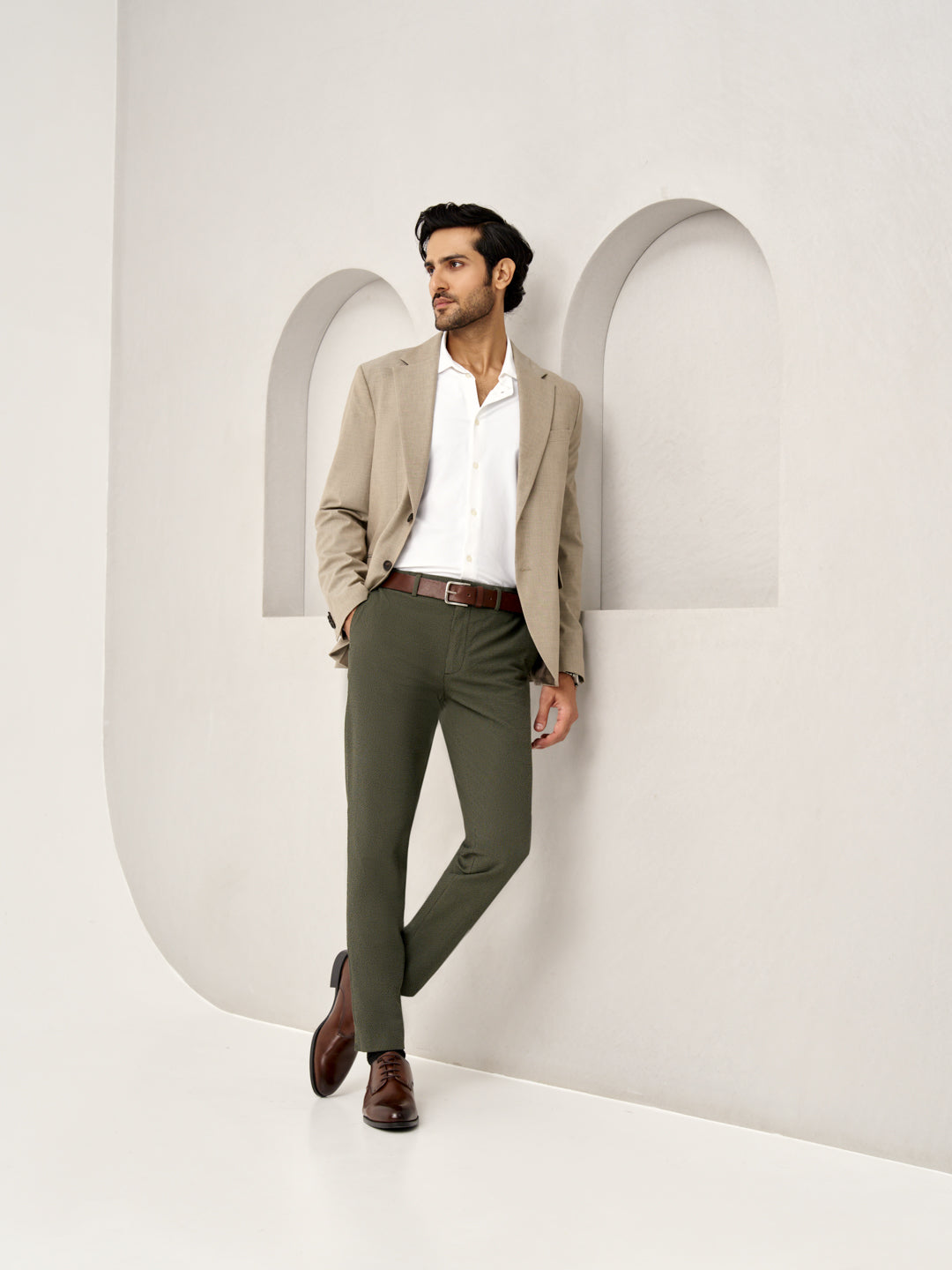 side view of olive chandigarh seer sucker relaxed fit trousers by Pant Project