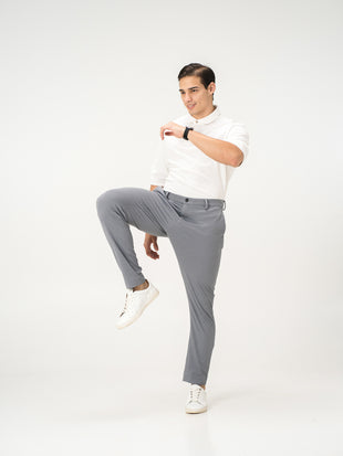 Light grey stretchable trousers by pant project, showcasing the sleek pintuck detail and comfortable fit.