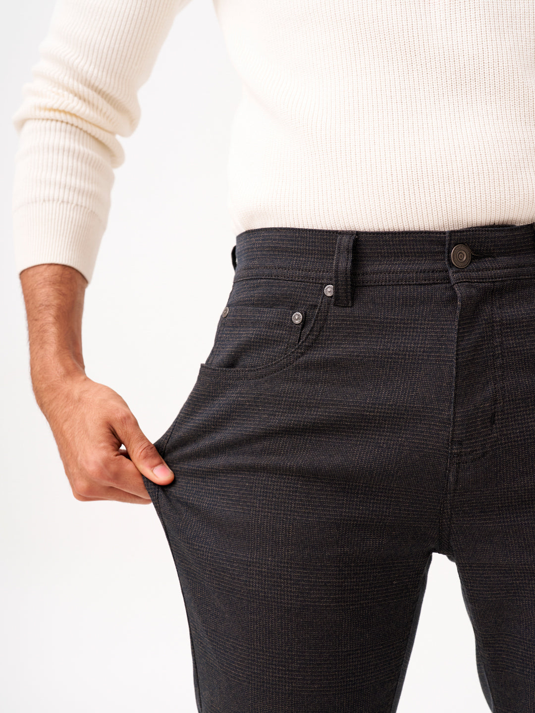 close-up front view of wood brown check jeanos by pant project highlighting texture