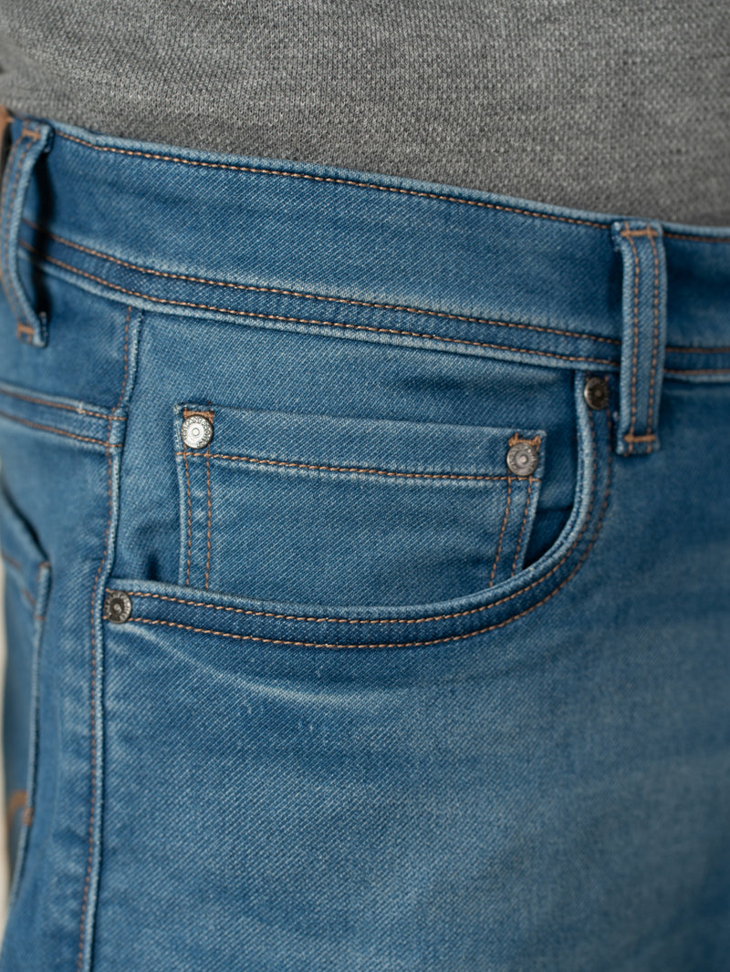 Walking Blue Tinted Whiskered Relaxed Fit Jeans