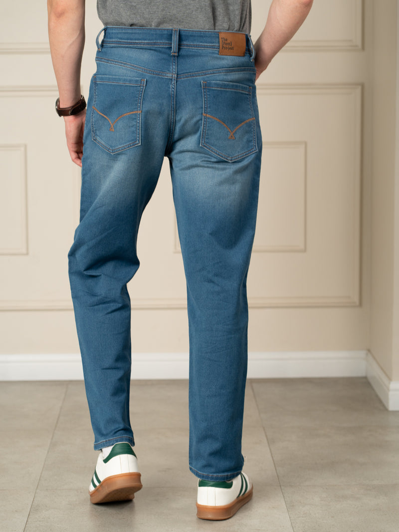 Walking Blue Tinted Whiskered Relaxed Fit Jeans