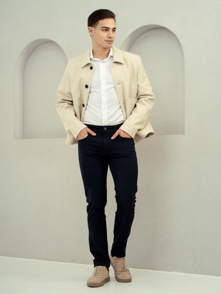 full view of navy jeans by pant project with slim fit