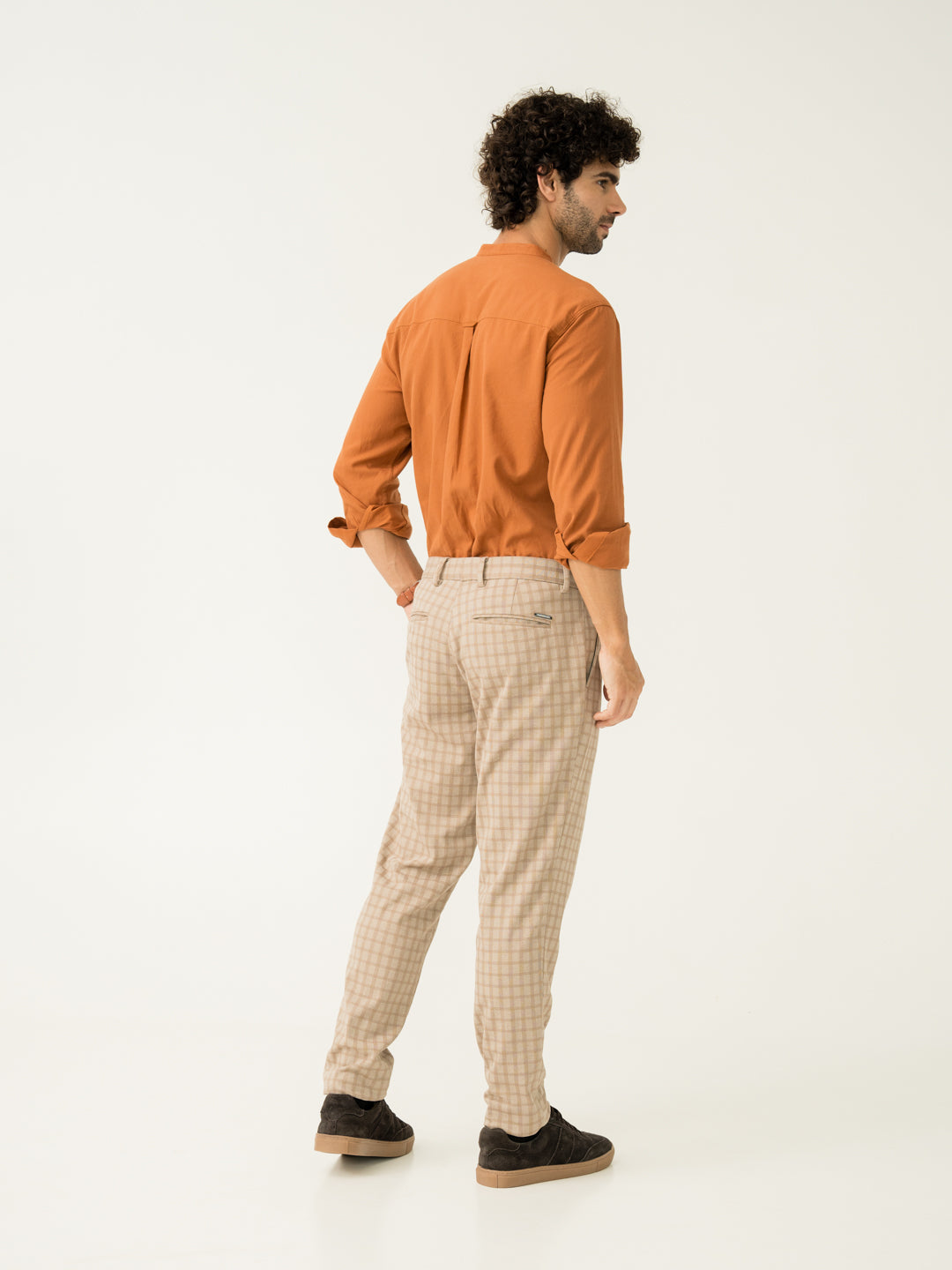 Full length back view of cayote khaki slim fit power stretch pant at Pant Project