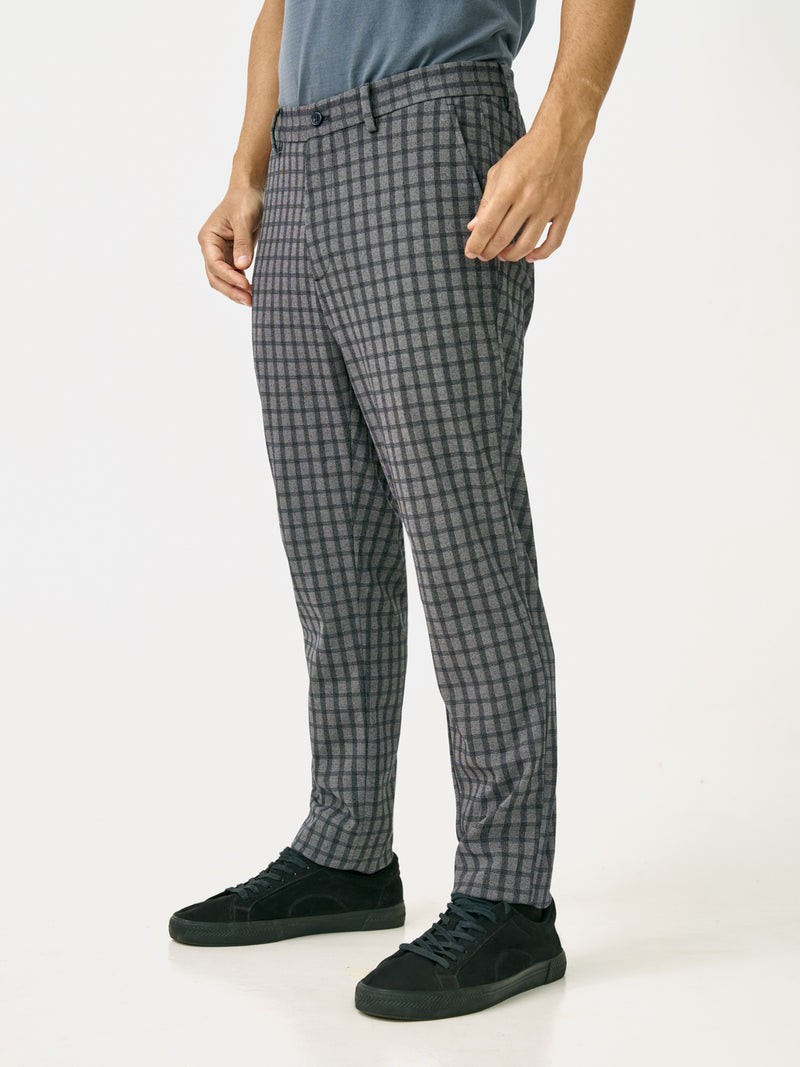 Side view of crow black checks slim fit power stretch pant at Pant Project