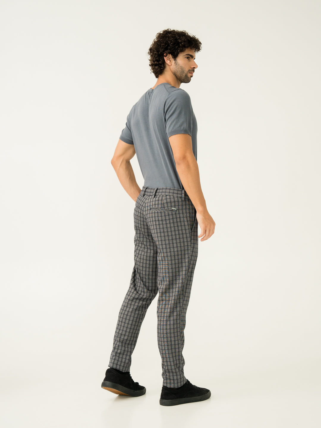 Full length back view of crow black checks slim fit power stretch pant at Pant Project