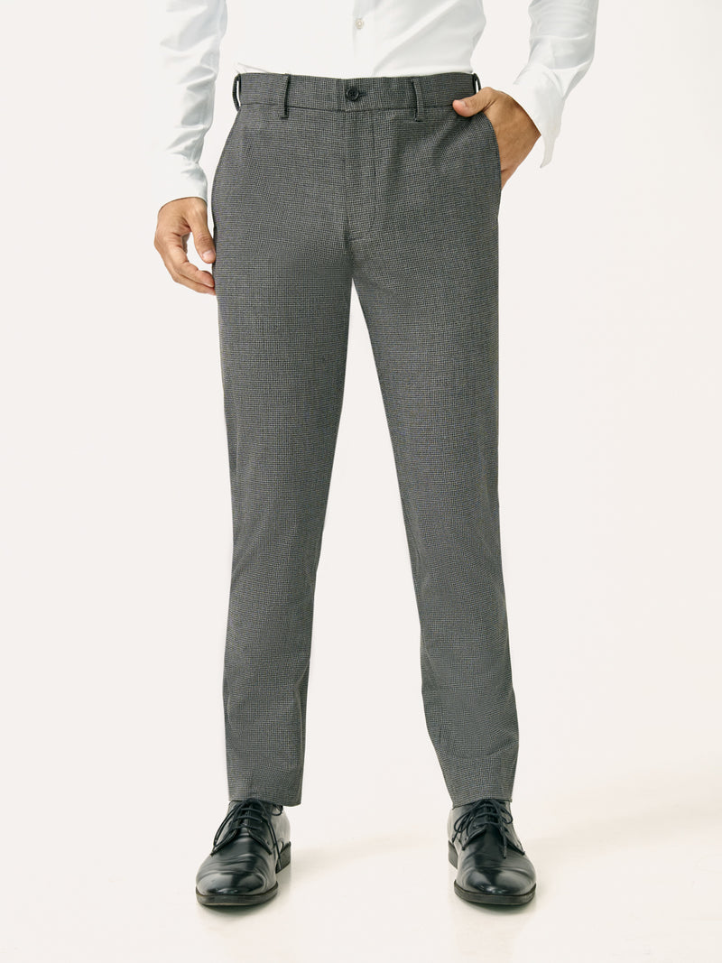 Front view of black & white micro check slim fit stretch formal pant at Pant Project