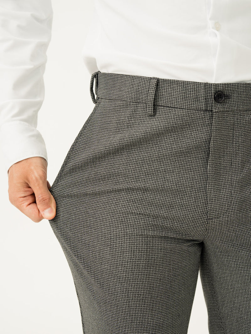 Stretch feature of black & white micro check slim fit stretch formal pant at Pant Project