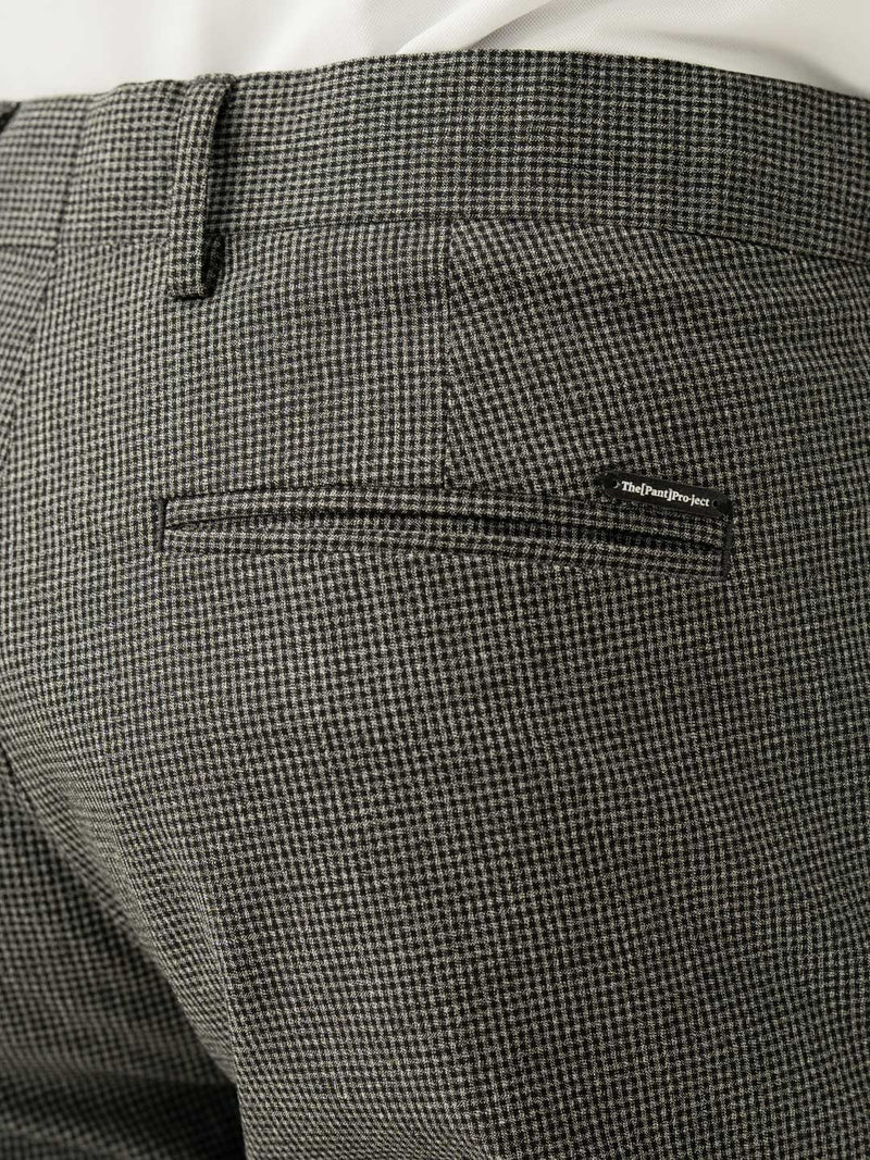 Back pocket detail of black & white micro check slim fit stretch formal pant at Pant Project