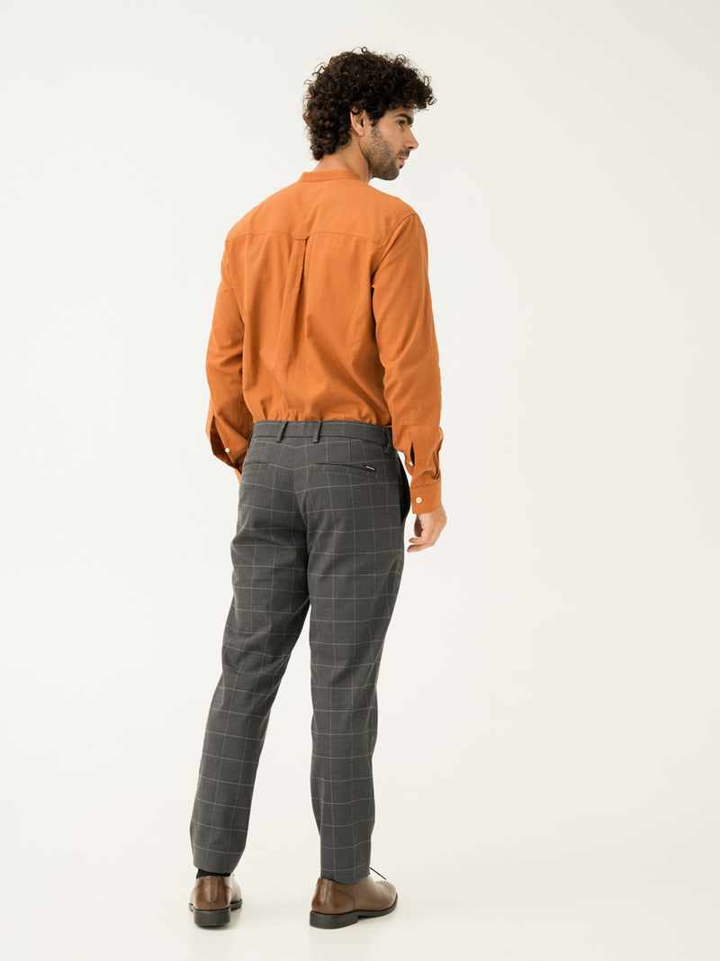 Side back view of coal windowpane check slim fit stretch formal pant at Pant Project