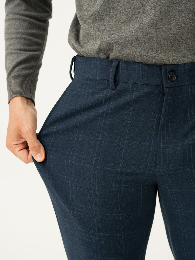 Stretch feature of navy blue checkered slim fit stretch formal pant at Pant Project