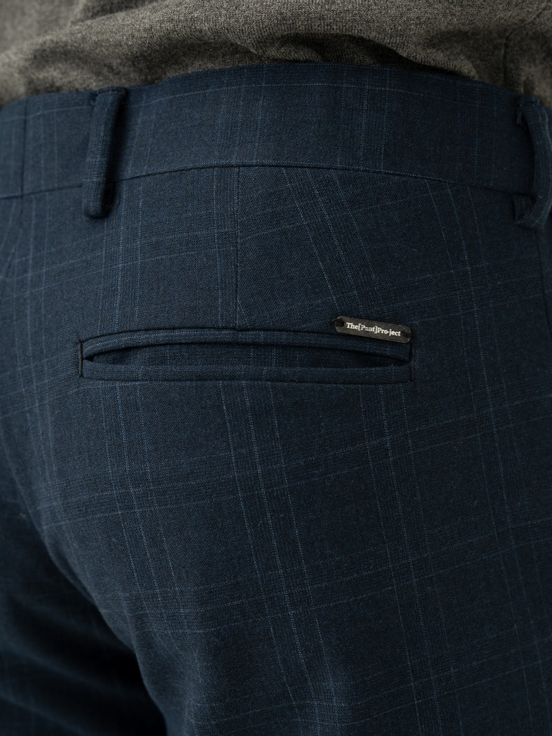 Back pocket detail of navy blue checkered slim fit stretch formal pant at Pant Project