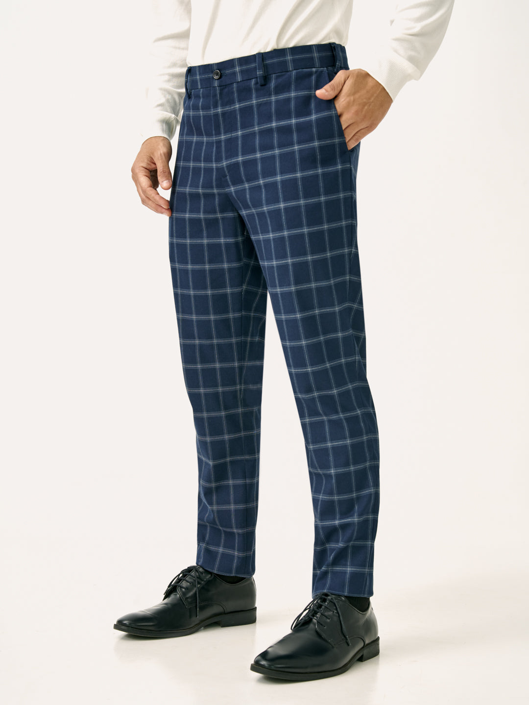 Side front view of blue big checkered slim fit stretch formal pant at Pant Project