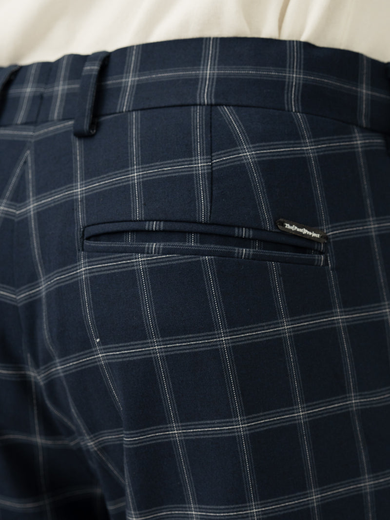 Back pocket detail of blue big checkered slim fit stretch formal pant at Pant Project