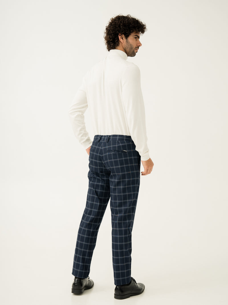 Back side view of blue big checkered slim fit stretch formal pant at Pant Project