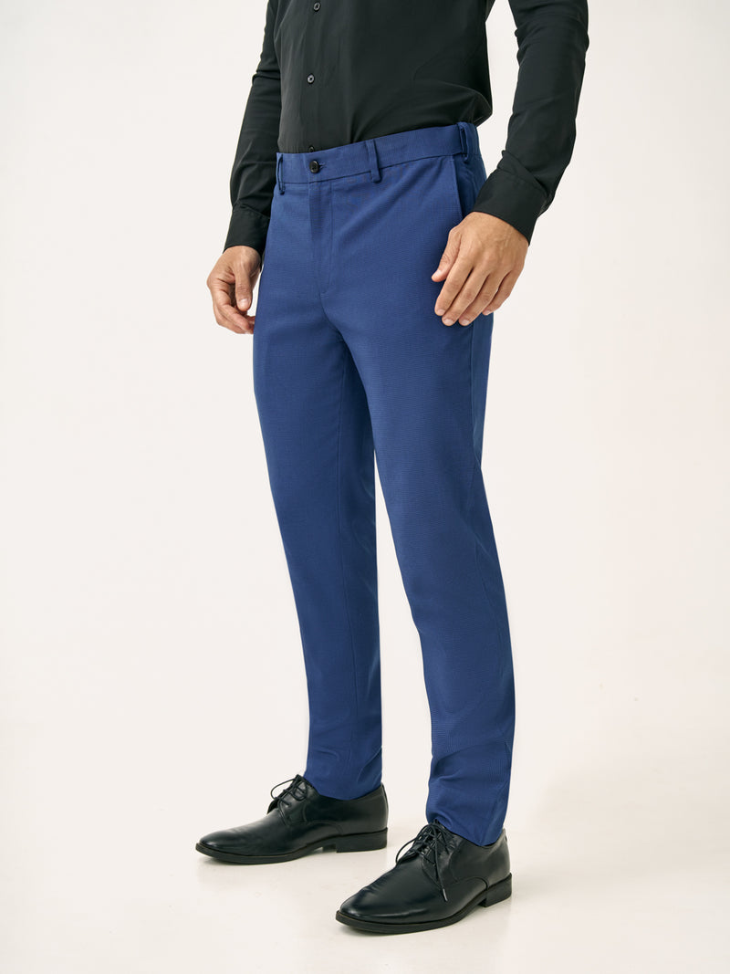 Side view of blue houndstooth slim fit stretch formal pant at Pant Project