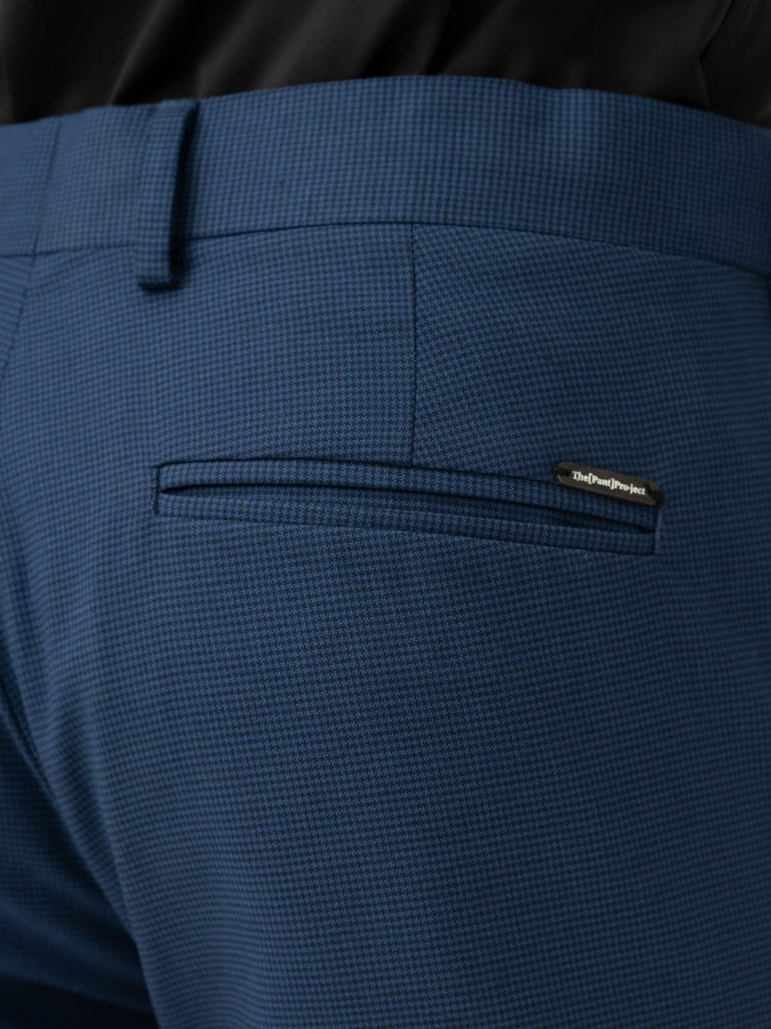 Back pocket detail of blue houndstooth slim fit stretch formal pant at Pant Project