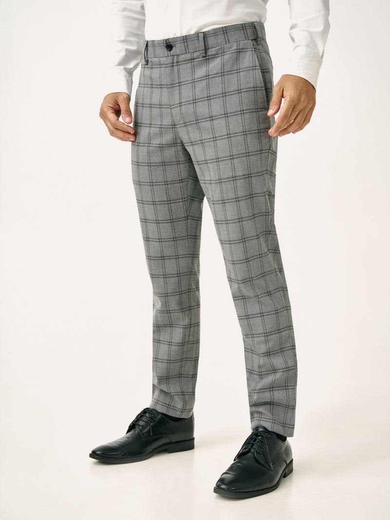 Front side view of grey big checkered slim fit stretch formal pant at Pant Project