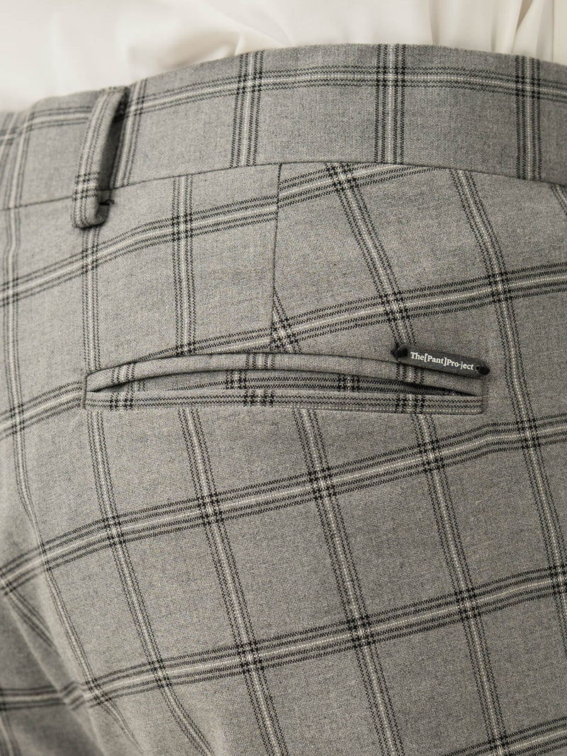 Back pocket detail of grey big checkered slim fit stretch formal pant at Pant Project