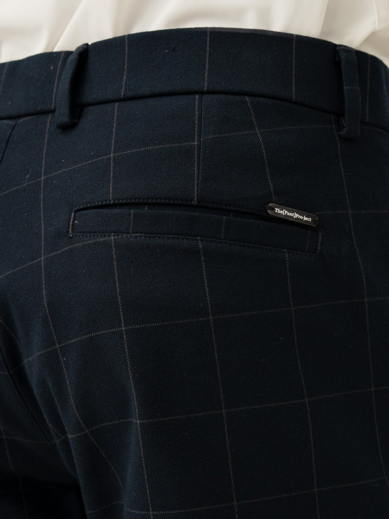 Back pocket detail of navy windowpane check slim fit stretch formal pant at Pant Project