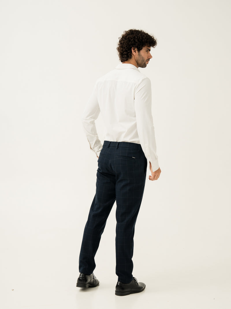 Side back view of navy windowpane check slim fit stretch formal pant at Pant Project