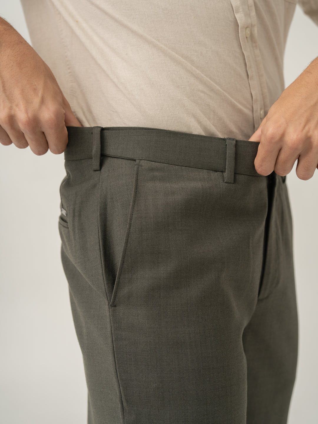 Stretch waistband close up of turtle olive luxury merino wool pant at Pant Project