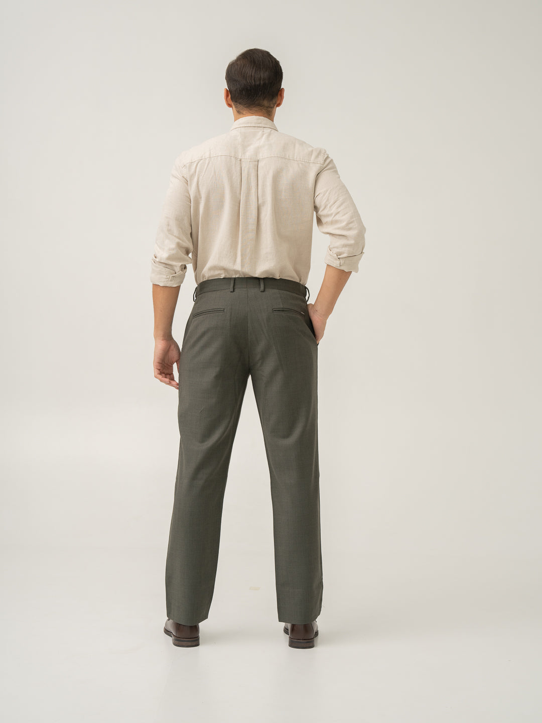 Full length back view of turtle olive luxury merino wool pant at Pant Project