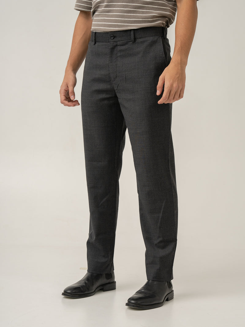 Side view of lamp black houndstooth merino wool pants at Pant Project