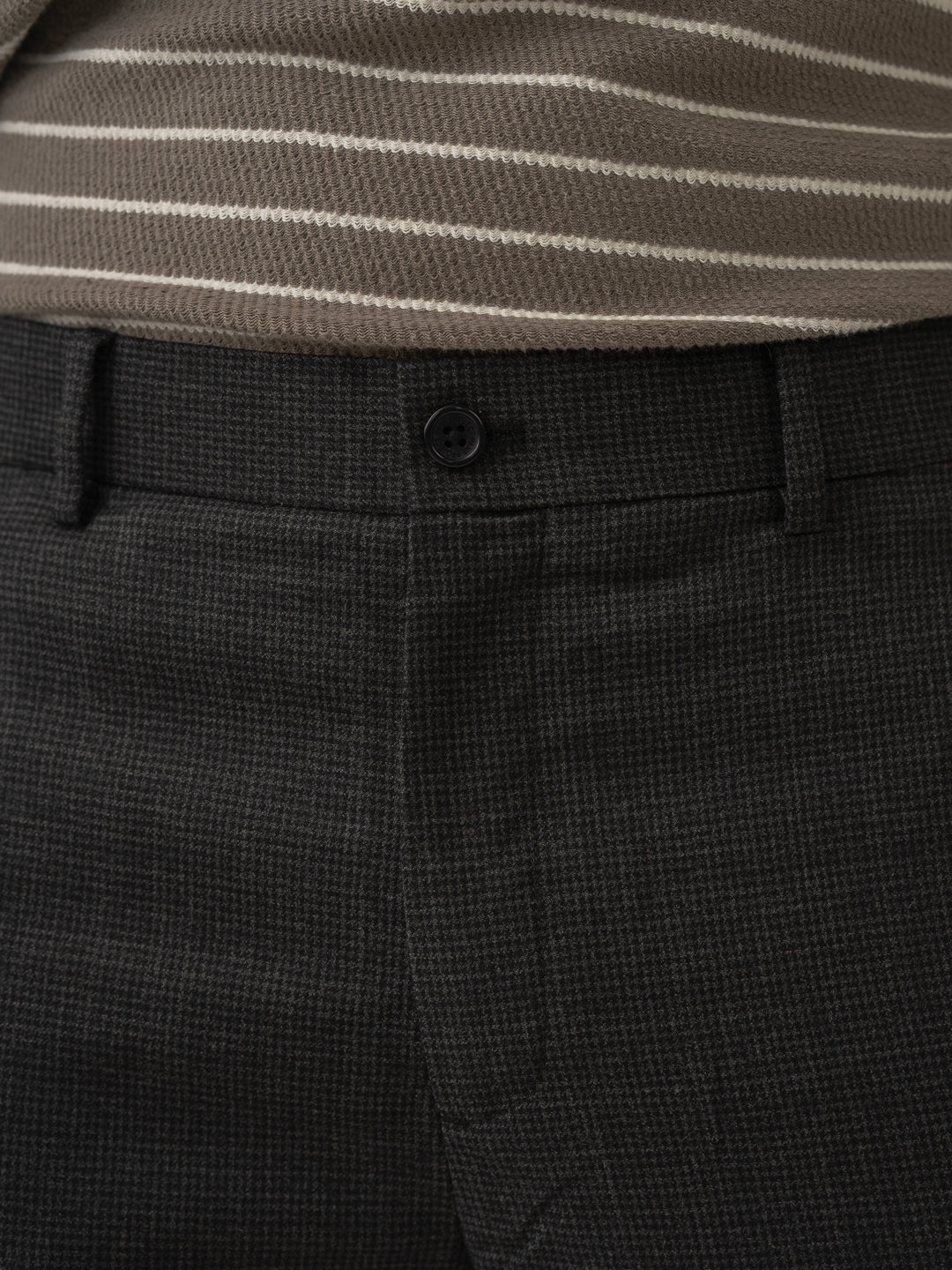 Waistband close up of lamp black houndstooth merino wool pants at Pant Project