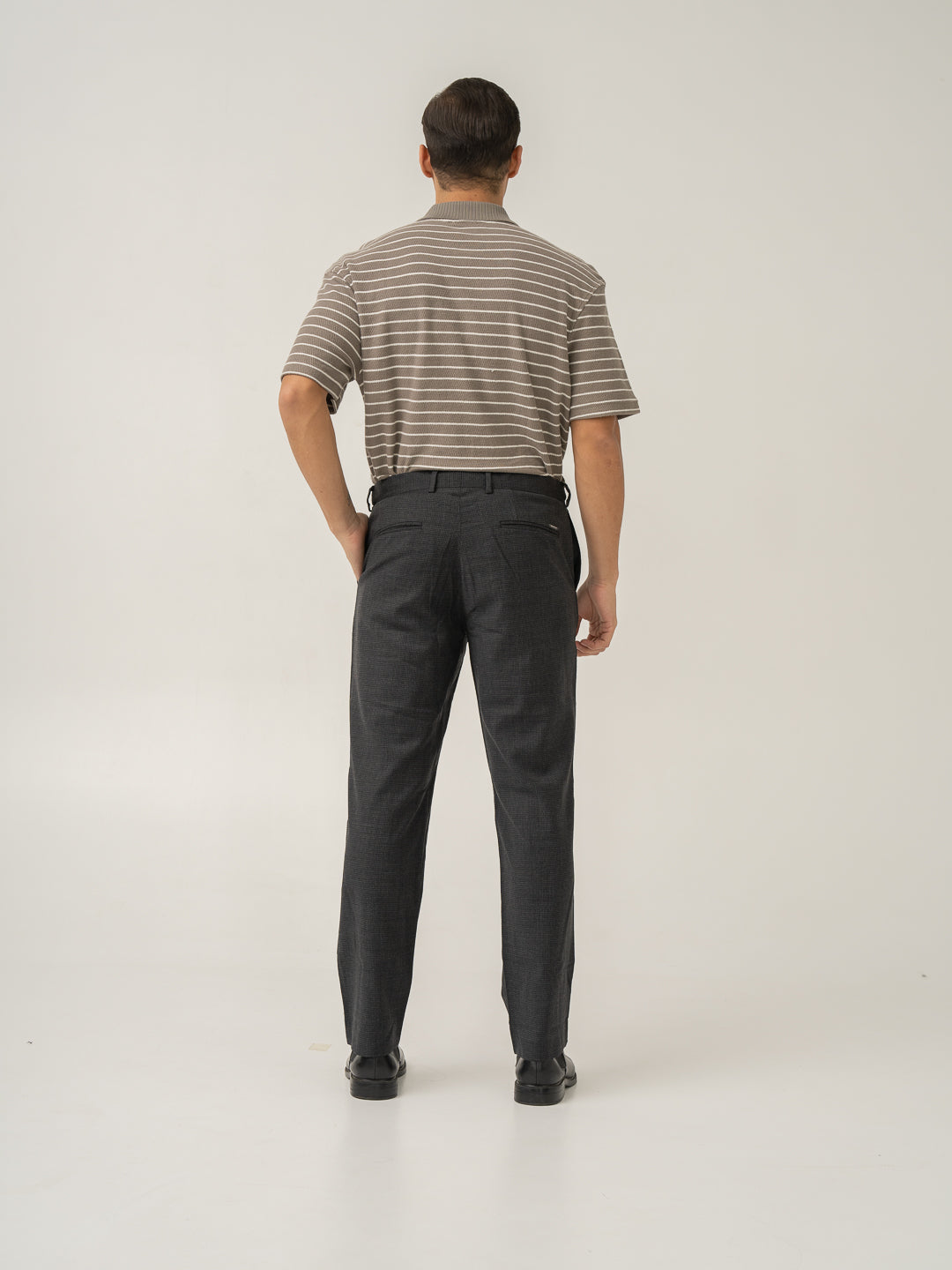 Full length back view of lamp black houndstooth merino wool pants at Pant Project