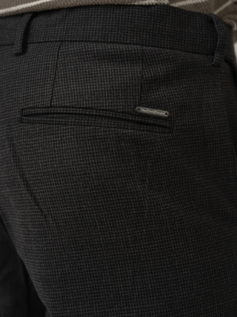 Back pocket detail of lamp black houndstooth merino wool pants at Pant Project