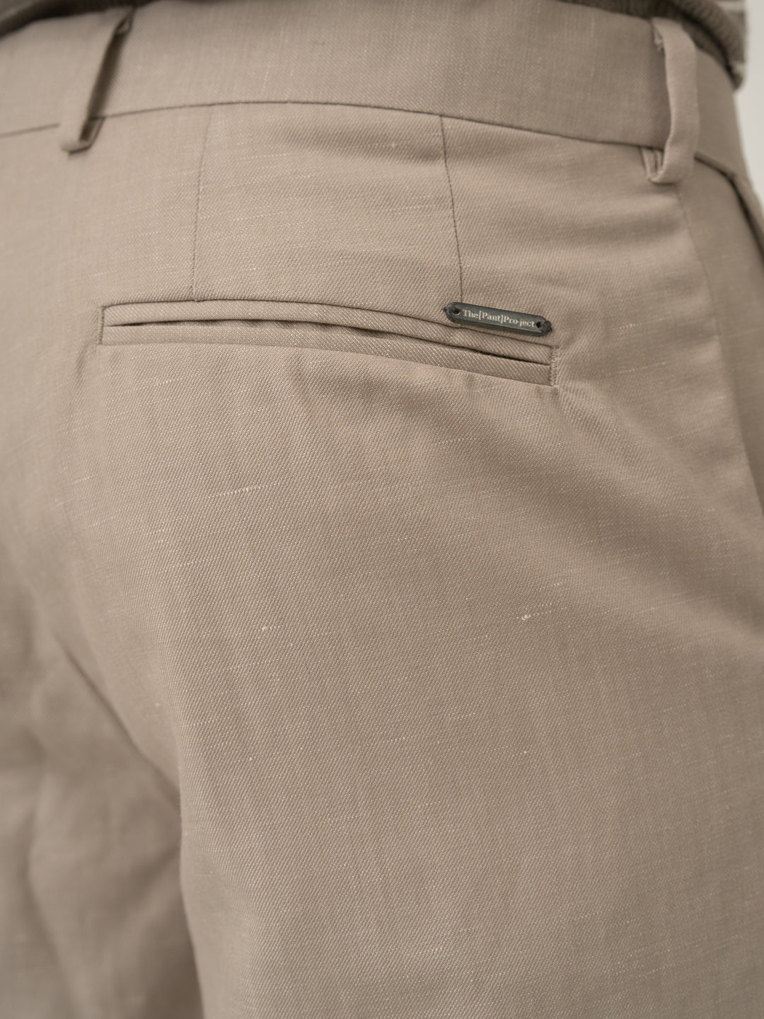 Back pocket detail of silica beige tropical wool linen pant at Pant Project