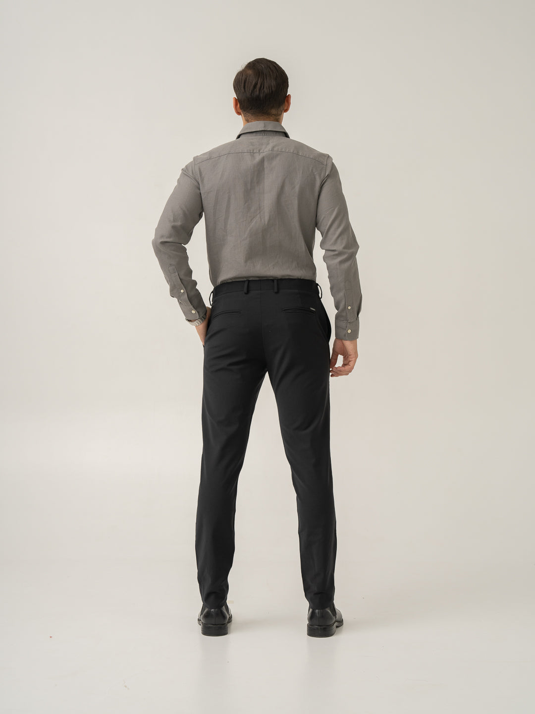 Full length back view of biella black luxury merino wool pant at Pant Project