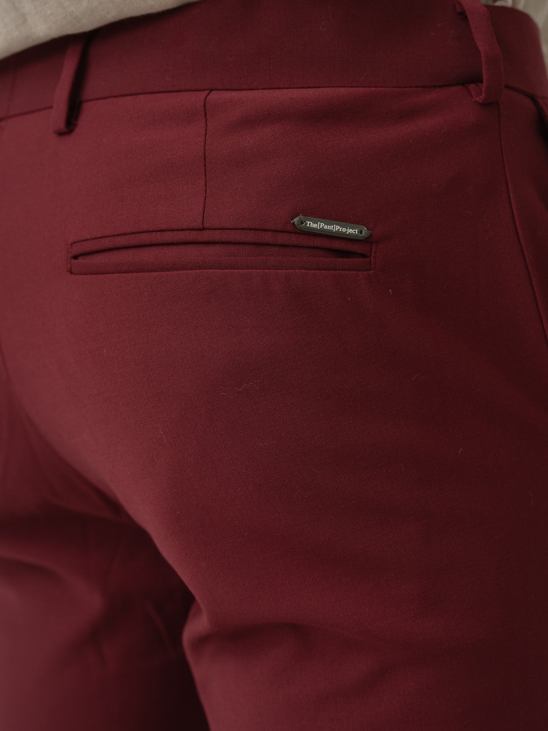 Back pocket detail of rome red luxury merino wool pant at Pant Project