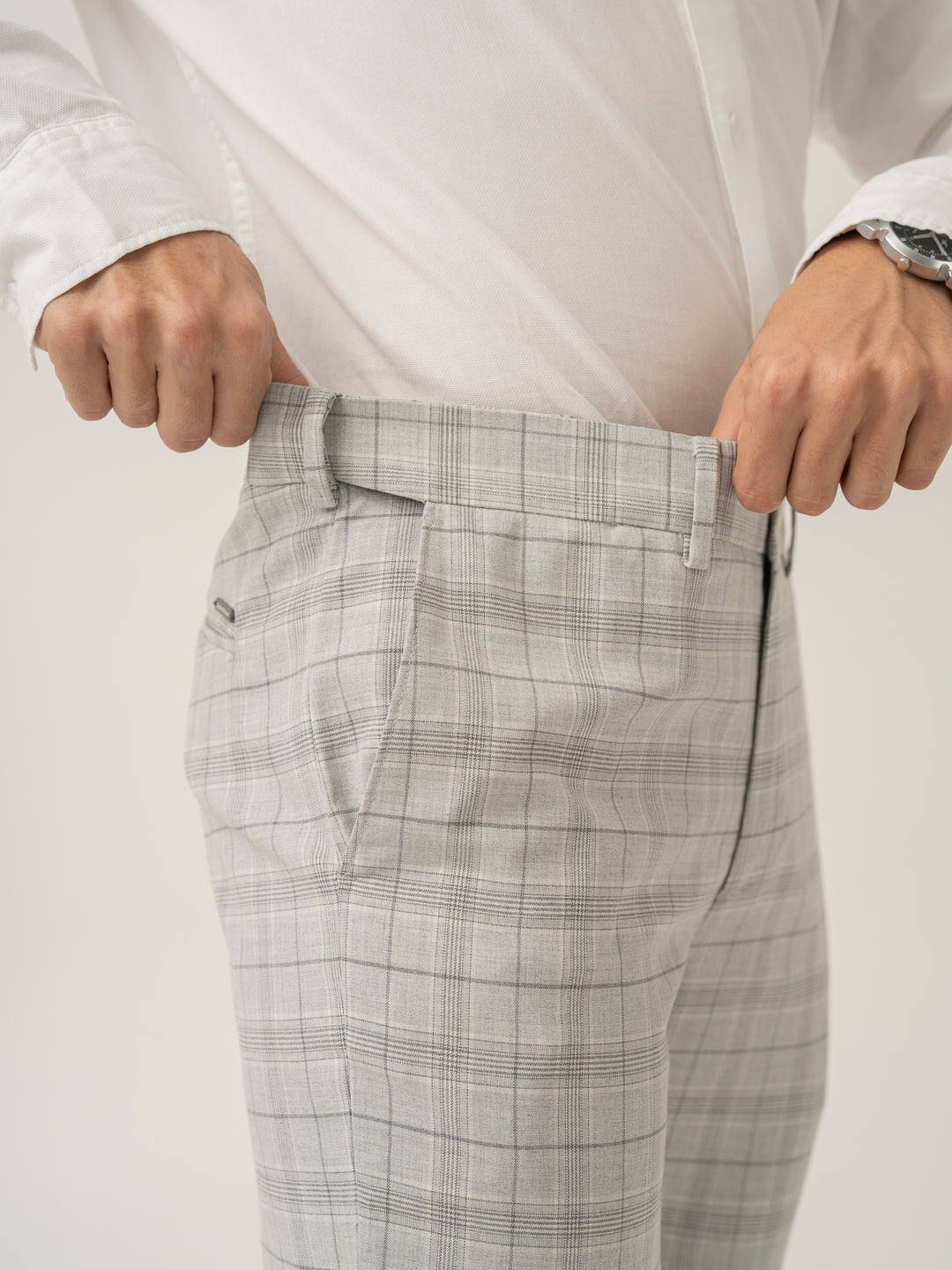 Stretch waistband close up of native grey checks formal pant at Pant Project